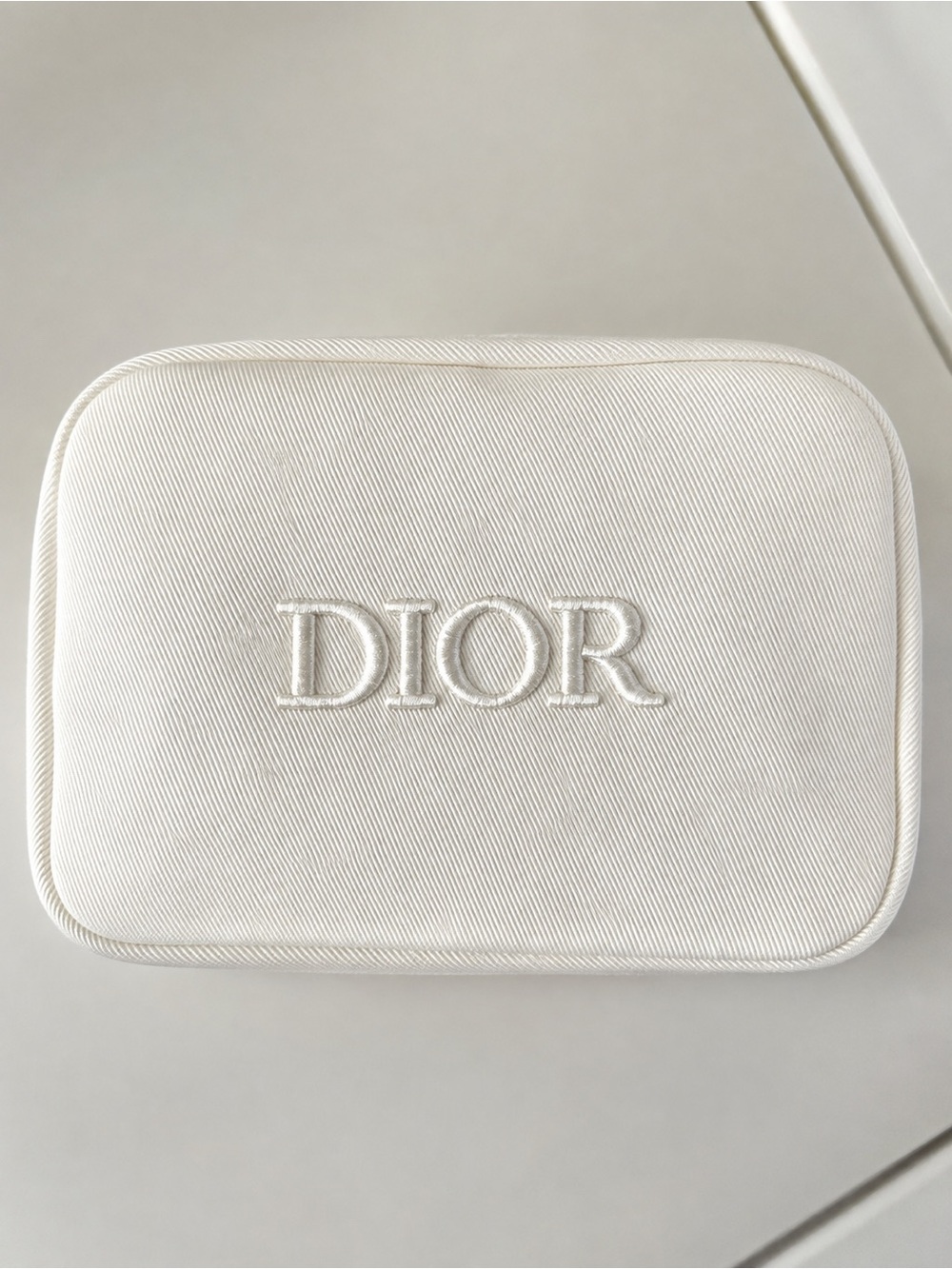 Dior Cream Men's Toiletry Pouch with Embroidered Logo